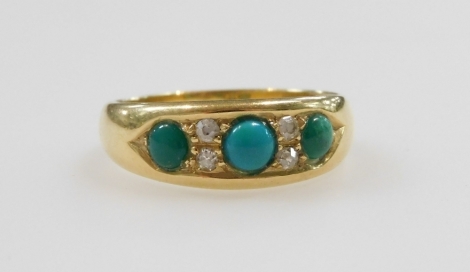 A late Victorian 18ct gold dress ring, set with three turquoise stones and old cut diamond chips, London 1900, size O, 4.8g all in.