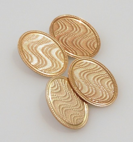 A pair of 9ct gold oval cufflinks, with chain links, 8.3g.