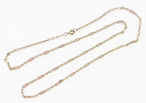 A fine fancy link neck chain, unmarked yellow metal, 65cm long, 5.6g.