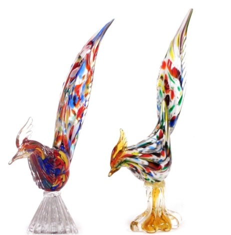 A pair of Murano style glass sculptures modelled as pheasants, each with a mottled glass multicoloured body, 40cm high.