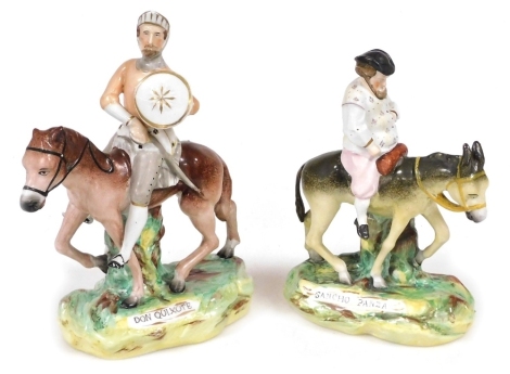 A pair of mid 19thC Staffordshire figures modelled as Don Quixote and Sancho Panza, raised on titled naturalistic bases, 24cm high and 21cm high respectively.