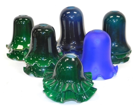 A group of coloured moulded glass light shades, blue and green. (1 tray)