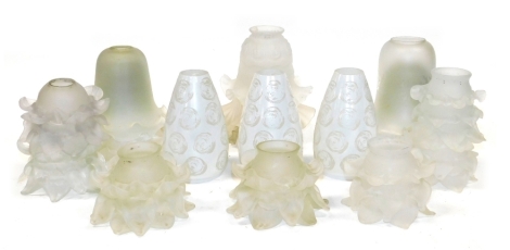 A group of frosted glass light shades, varying designs of trumpet form, petal form, etc. (1 tray)