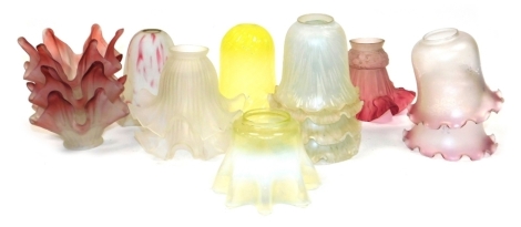 A group of frosted and other glass light shades, to include a graduated yellow glass example, 15cm high, a vaseline glass shade, 10cm high, frosted pink shades, etc. (1 tray)