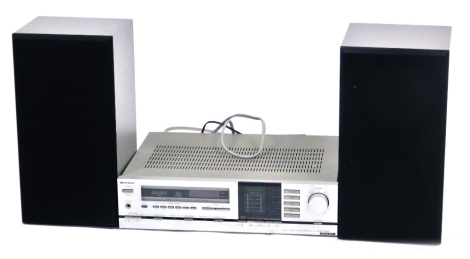 A Hitachi AM/FM stereo tuner amplifier, HTA-40000, together with a pair of Hitachi speakers, model MU-10. Buyer Note: WARNING! This lot contains untested or unsafe electrical items. It is supplied for scrap or reconditioning only. TRADE ONLY