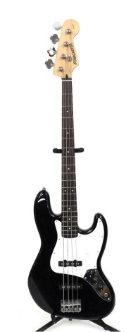 A Fender Starcaster Jay Bass electric bass guitar, with black and white body, S/N ICS09010725, boxed.