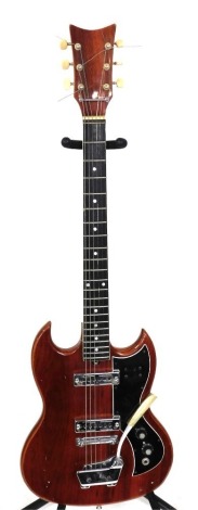 A Kay electric guitar, with cherrywood finish body.