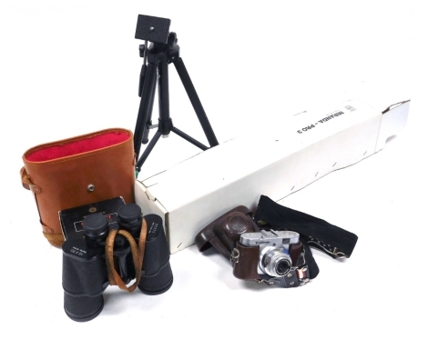 A Voigtlander Vito B camera, with a Skopar 1:3 5/50 lens, Miranda Titan 202 tripod, compact video light, further tripod, and a pair of Boots 10x50 binoculars, cased.