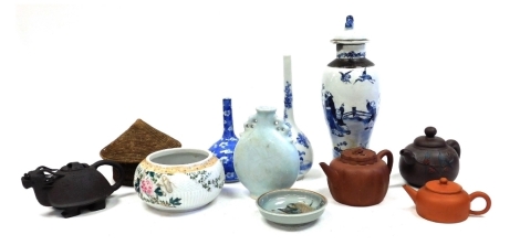 A group of Chinese ceramics, including red ware and terracotta teapots, blue and white vase and cover, further blue and white, and a Japanese bowl. (a quantity)