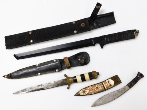 A Middle Eastern hunting knife, with a bone and ebonised handle, smaller knife with a bone and horn sheath, and one further knife. (3)