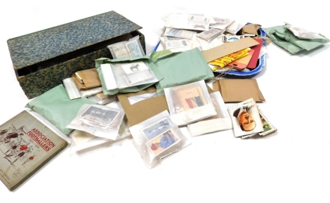 Philately and cartophily, comprising a box file of loose stamps, sets and part sets of cigarettes cards and tea bag cards, etc. (a quantity)