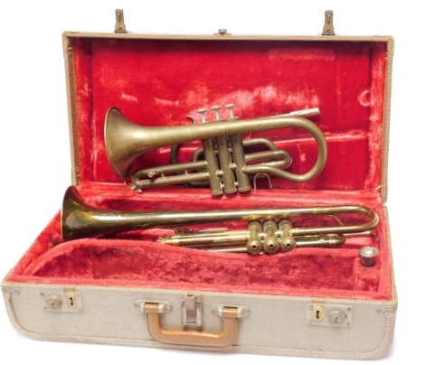 A Boosey and Hawkes Limited Regent brass trumpet, cased, and a further trumpet, stamped ML658250.