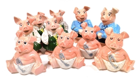 Wade NatWest piggy banks, comprising two mothers, four girls, and four babies.