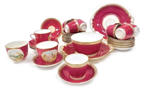 A mid 19thC Staffordshire porcelain tea service, gilt decorated against a red ground, including bread plates, slop bowl, teacups and saucers, further teacups and saucers with reserves painted with landscapes. (a quantity)