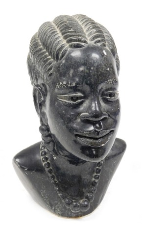 A Zimbabwean stone bust of a lady, possibly Shona tribe, 25cm high.