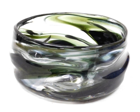 A Whitefriars knobbly glass bowl, with green streaked decoration, 23cm wide.