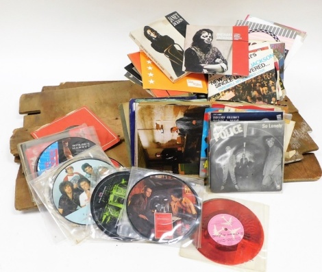 A group of 45rpm singles, to include Culture Club, T Rex, Michael Jackson, Madonna, tapes, etc. (a quantity)