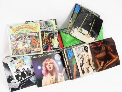 A quantity of LP records, to include Eagles, Queen, Prince, Madonna, Jon Bon Jovi, Dire Straits, Eagles, Meatloaf, etc. (AF)