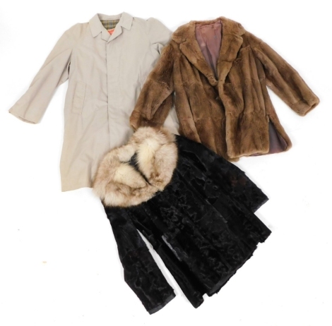 Two fur jackets, one in dark brown with a pale coloured collar, underarm measurement 38cm, together with a mid century mackintosh overcoat.