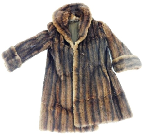 A brown fur three quarter length coat, underarm measurement, 38cm.