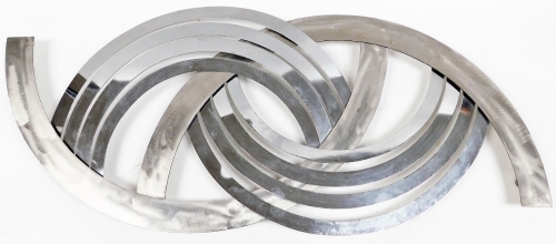 A modernist metal wall hanging, formed as semi overlapping semi circles, 103m wide.