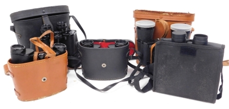 Five pairs of binoculars, including Regent, Glider and Tasco, all cased.