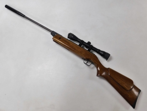 A BAM air rifle, XXB12 calibre, 5.5/22, with silencer and sight, cased.