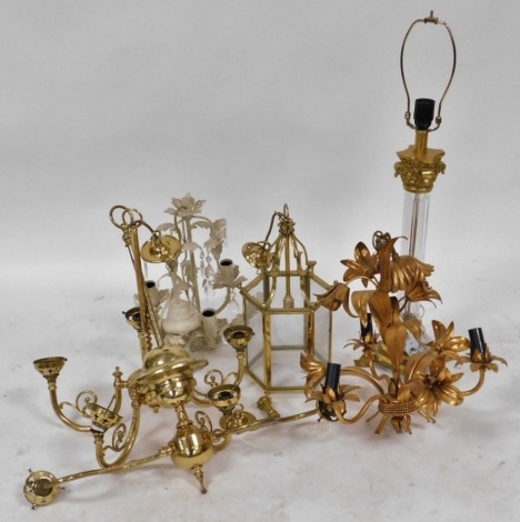 A group of lighting, comprising a brass five branch chandelier, two branch chandelier, gilt metal floral three branch chandelier, similar in white, a brass hexagonal lantern and a brass and cut glass Corinthian column table lamp. (6)