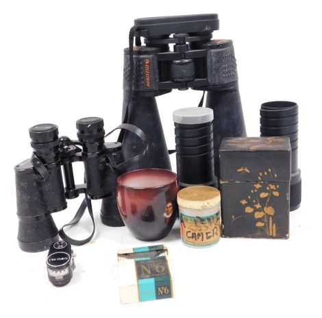 A pair of Skymaster 25x70 FOV-2.7 binoculars, pathescope binoculars, Kodak lens, lacquer box containing playing cards and further collectables.