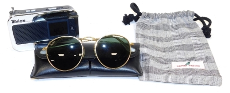 A pair of Bausch and Lomb Rayban vintage sunglasses, with warranty, cased, together with a Tevion AM/FM world band radio. (2)