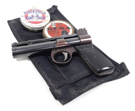 A Webley Junior .177 air pistol, serial no. 2646, together with two tins of air pistol pellets.