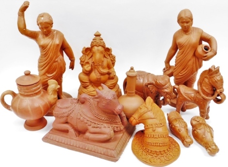 A group of Indian terracotta figures and tablewares, including Hindu deities and animals, and a cockerel form pot. (a quantity)