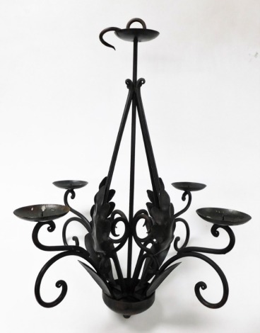 A cast iron four branch pricket candle chandelier, 80cm high.