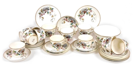 A late 19thC porcelain part tea service, decorated in the Indiana pattern, comprising slop or sugar bowl, twelve tea cups, ten saucers and six tea plates.