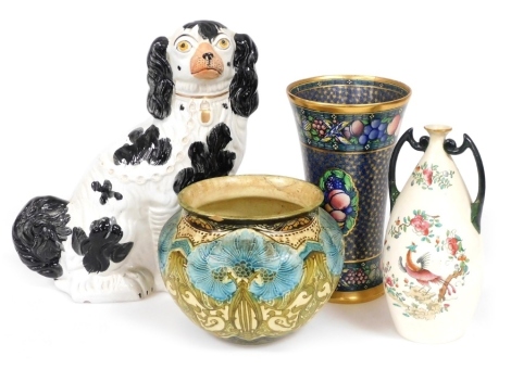 A Minton Seccesionist small jardiniere, tube lined and painted with stylised flowers, no.3361/6, Minton Rotiques vase, further twin handled vase, and a Staffordshire pottery figure of a spaniel. (4, AF)