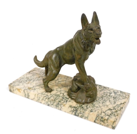 An early 20thC Continental cast metal figure of a wolfhound, raised on a rectangular marble base, 31.5cm wide.