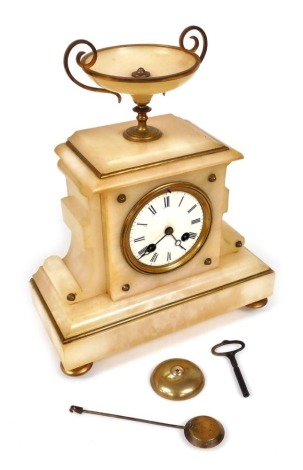 A French late 19thC white marble cased mantel clock, by Japy Freres et Cie, circular white enamel dial bearing Roman numerals, eight day movement with bell strike, the case of architectural form, surmounted by a tazza, raised on four brass feet, with pend