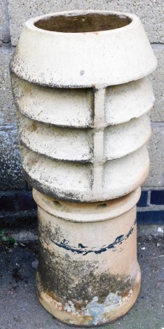 A terracotta chimney stack, of cylindrical form, white painted, 83cm high.