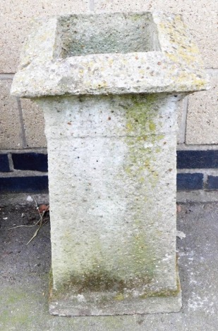 A concrete chimney stack, of square tapering form with outswept lip, 67cm high.