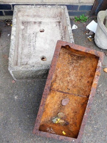 A carved stone planter, of rectangular form, the front and sides decorated with birds, 70cm wide, together with a cast metal feeder, of rectangular cylindrical form, 64cm wide.