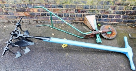 A George Monro Ltd sexton seed drill, together with a cultivator.