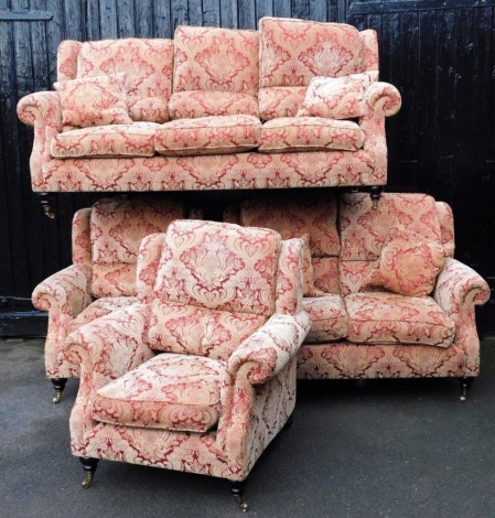 A Parker Knoll Oakham four piece lounge suite, comprising a three seater sofa, 212cm wide, two seater sofa, 150cm wide, and a pair of armchairs, each 92cm wide.