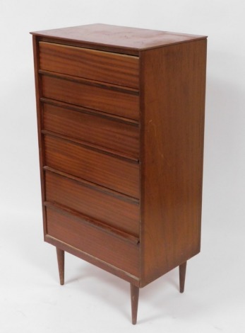 An Austin suite teak chest, of six drawers, raised on turned legs, 123cm high, 65.5cm wide, 43cm deep. (AF)