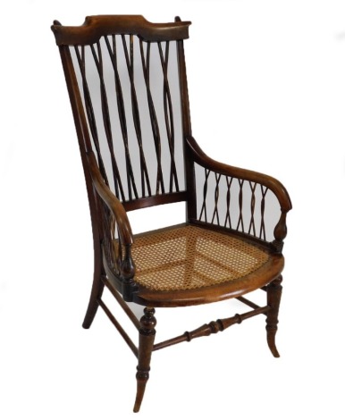 A Victorian mahogany and cane seated nursing chair, 55cm wide.