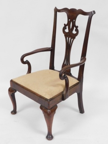 A Georgian Chippendale style mahogany carver chair, with a carved splat, drop in seat, raised on cabriole legs, 64cm wide.