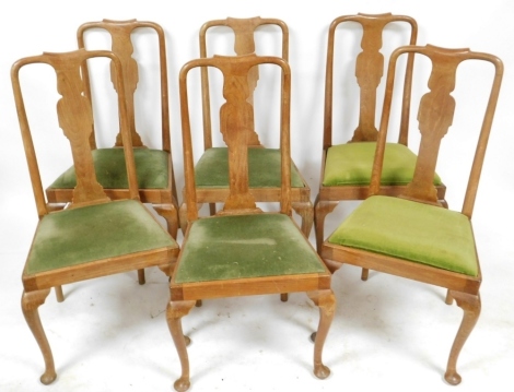 A set of six early 20thC mahogany dining chairs, with drop in seats, raised on cabriole legs.