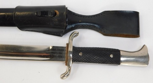 A German dagger, with knurled hand grip, fullered blade, 25cm long ...