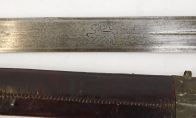 A 19thC Sudanese fighting sword, with white metal knop to the leather hand grip, with cross hilt, the blade having stylised sun to one side and big cat engraved verso, 92cm long, and leather scabbard with metal mounts, 112cm overall length. - 2