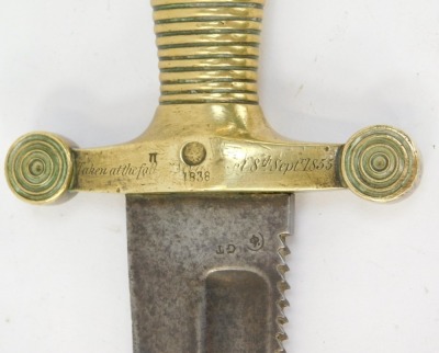 A 19thC Imperial Russian Pioneer 1838 sawback sword, with a brass ringed topped, inscribed Taken at the Fall 8th September 1855, probably Siege of Sevastopol during the Crimean War, with a serrated steel blade stamped CC and GT, 82cm long. - 2