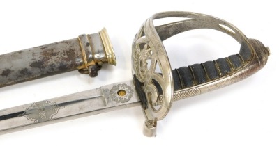 A Victorian Rifle Brigade officer's sabre, with a stainless steel engraved blade, stamped Henry Wilkinson Pall Mall, London, with a wirework bound shagreen grip, and metal scabbard, 100cm long.